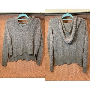 Shorter in the front then the back! Has a hoodie